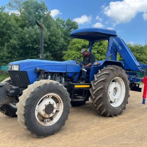 New Holland 6610 Tractor with Spartan Crane